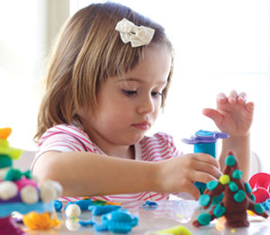 girl-playing-with-clay girl playing with clay