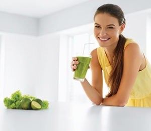 happy-woman-drinking-smoothy happy woman drinking smoothy