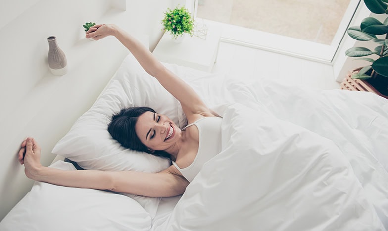 woman wake up happy