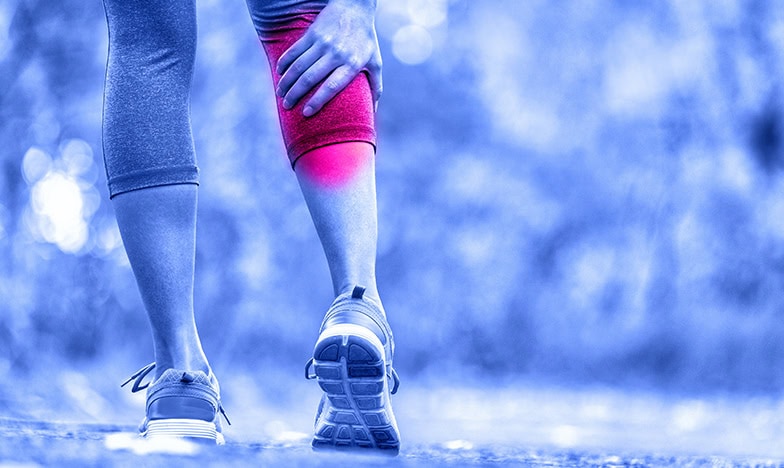 woman with cramps leg